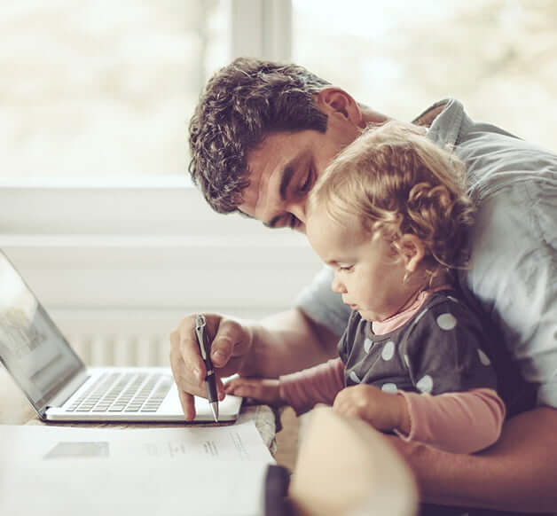 dad and baby with computer