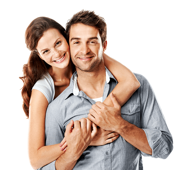woman hugging man from behind and smiling